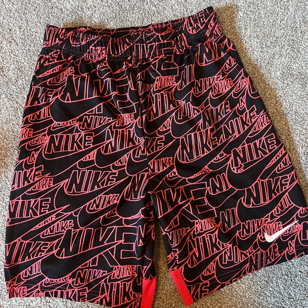 Nike youth Black and pink  Athletic Shorts with Bold Logo Design
